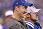 INDIANAPOLIS, IN - DECEMBER 18:  Peyton Manning #18 of the Indianapolis Colts smiles in the bench area during Colts 27-13 win over the Tennessee Titans in the NFL game at Lucas Oil Stadium on December 18, 2011 in Indianapolis, Indiana.  (Photo by Andy Lyons/Getty Images)