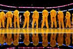 MIAMI, FL - JANUARY 19: The Los Angeles Lakers line up before a game against the Miami Heat at American Airlines Arena on January 19, 2012 in Miami, Florida. NOTE TO USER: User expressly acknowledges and agrees that, by downloading and/or using this Photograph, User is consenting to the terms and conditions of the Getty Images License Agreement.  (Photo by Mike Ehrmann/Getty Images)
