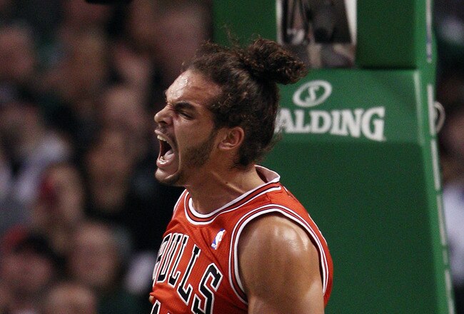 BOSTON, MA - JANUARY 13:  Joakim Noah #13 of the Chicago Bulls celebrates his basket in the first quarter against the Boston Celtics on January 13, 2012 at TD Garden in Boston, Massachusetts. NOTE TO USER: User expressly acknowledges and agrees that, by downloading and or using this photograph, User is consenting to the terms and conditions of the Getty Images License Agreement.  (Photo by Elsa/Getty Images)