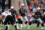 FOXBORO, MA - JANUARY 22:  Tom Brady #12 of the New England Patriots hikes the ball against the Baltimore Ravens during their AFC Championship Game at Gillette Stadium on January 22, 2012 in Foxboro, Massachusetts.  (Photo by Rob Carr/Getty Images)