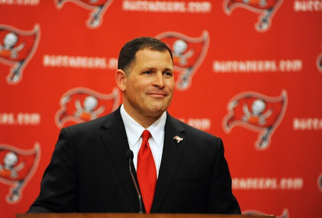 TAMPA, FL - JANUARY 27:  Coach Greg Schiano of the Tampa Bay Buccaneers speaks to the media at an introduction press conference at the team training facility January 27, 2012 in Tampa, Florida. (Photo by Al Messerschmidt/Getty Images)