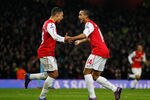 LONDON, ENGLAND - JANUARY 29:  Theo Walcott of Arsenal (14) celebrates with team mate Alex Oxlade-Chamberlain as he scores their second gaol during the FA Cup with Budweiser Fourth Round match between Arsenal and Aston Villa at Emirates Stadium on January 29, 2012 in London, England.  (Photo by Paul Gilham/Getty Images)