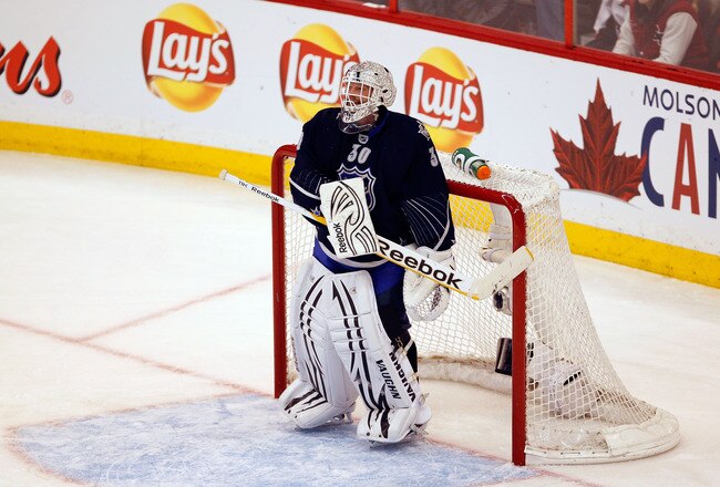 OTTAWA, ON - JANUARY 29: Tim Thomas #30 of the Boston Bruins and Team Chara looks on against Team Alfredsson during the 2012 Tim Hortons NHL All-Star Game at Scotiabank Place on January 29, 2012 in Ottawa, Ontario, Canada.  (Photo by Gregory Shamus/Getty Images)