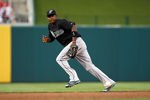 WASHINGTON, DC - JULY 27: Hanley Ramirez #2 of the Florida Marlins fields a ground ball against the Washington Nationals at Nationals Park on July 27, 2011 in Washington, DC. The Marlins won 7-5. (Photo by Ned Dishman/Getty Images)