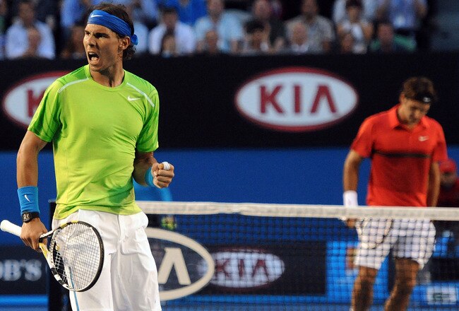 MELBOURNE, VICTORIA - JANUARY 26:  Rafael Nadal of Spain celebrates winning a point in his semifinal match against Roger Federer of Switzerland during day eleven of the 2012 Australian Open at Melbourne Park on January 26, 2012 in Melbourne, Australia.  (Photo by Pool/Getty Images)