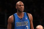 LOS ANGELES, CA - JANUARY 16: Lamar Odom #7 of the Dallas Mavericks gets an ovation from the crowd includin actor Jack Nicholson as he enters the game against the Los Angeles Lakers at Staples Center on January 16, 2012 in Los Angeles, California.  NOTE TO USER: User expressly acknowledges and agrees that, by downloading and or using this photograph, User is consenting to the terms and conditions of the Getty Images License Agreement.  (Photo by Stephen Dunn/Getty Images)