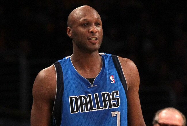 LOS ANGELES, CA - JANUARY 16: Lamar Odom #7 of the Dallas Mavericks gets an ovation from the crowd includin actor Jack Nicholson as he enters the game against the Los Angeles Lakers at Staples Center on January 16, 2012 in Los Angeles, California.  NOTE TO USER: User expressly acknowledges and agrees that, by downloading and or using this photograph, User is consenting to the terms and conditions of the Getty Images License Agreement.  (Photo by Stephen Dunn/Getty Images)