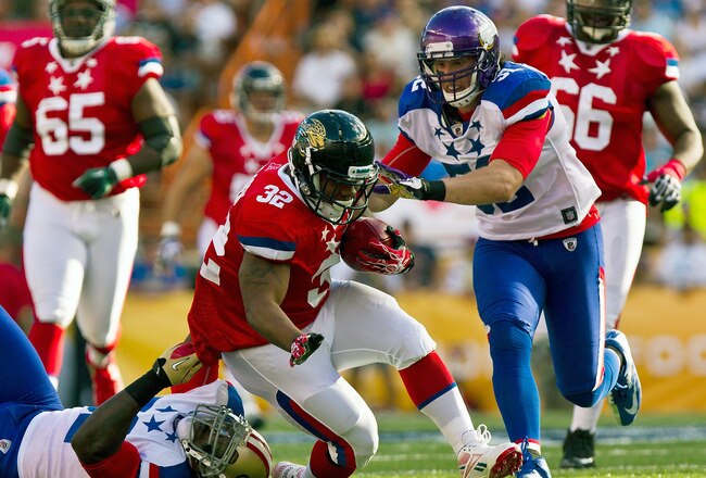 HONOLULU, HI - JANUARY 29:  Maurice Jones-Drew #32 of the Jacksonville Jaguars is stopped by the NFC defense during the 2012 NFL Pro Bowl at Aloha Stadium on January 29, 2012 in Honolulu, Hawaii.  (Photo by Kent Nishimura/Getty Images)