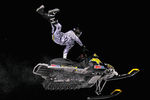 ASPEN, CO - JANUARY 27:  Justin Hoyer kicks out as he sours across a jump during the Snowmobile Freestyle elimination rounds at Winter X Games 15 on Buttermilk Mountain on January 27, 2011 in Aspen, Colorado. Hoyer went on to finish second in the finals.  (Photo by Doug Pensinger/Getty Images)