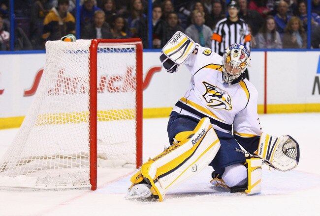 ST. LOUIS, MO - DECEMBER 30:  Pekka Rinne #35 of the Nashville Predators makes a save against the St. Louis Blues at the Scottrade Center  on December 30, 2011 in St. Louis, Missouri.  (Photo by Dilip Vishwanat/Getty Images)