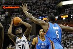 MEMPHIS, TN - MAY 13:  Zach Randolph #50 of the Memphis Grizzlies shoots against Kendrick Perkins #5 of the Oklahoma City Thunder in Game Six of the Western Conference Semifinals in the 2011 NBA Playoffs at FedExForum on May 13, 2011 in Memphis, Tennessee.  NOTE TO USER: User expressly acknowledges and agrees that, by downloading and/or using this photograph, User is consenting to the terms and conditions of the Getty Images License Agreement.  (Photo by Kevin C. Cox/Getty Images)