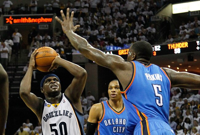 MEMPHIS, TN - MAY 13:  Zach Randolph #50 of the Memphis Grizzlies shoots against Kendrick Perkins #5 of the Oklahoma City Thunder in Game Six of the Western Conference Semifinals in the 2011 NBA Playoffs at FedExForum on May 13, 2011 in Memphis, Tennessee.  NOTE TO USER: User expressly acknowledges and agrees that, by downloading and/or using this photograph, User is consenting to the terms and conditions of the Getty Images License Agreement.  (Photo by Kevin C. Cox/Getty Images)