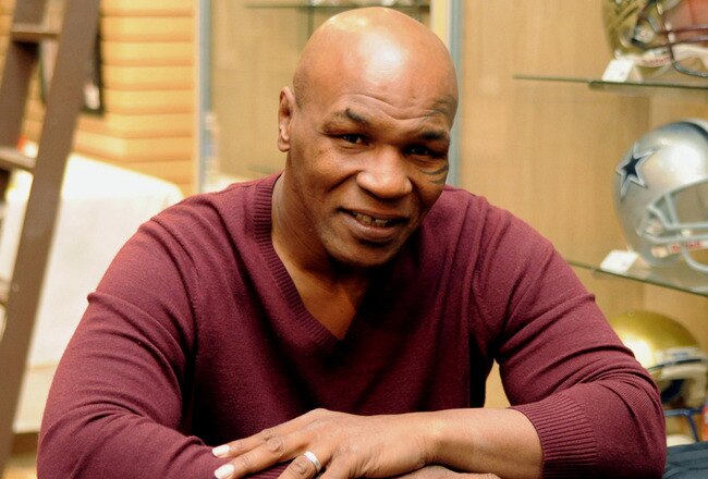 LAS VEGAS - FEBRUARY 4:  In this handout photo provided by Las Vegas News Bureau, former heavyweight boxing champion Mike Tyson attends an autograph-signing session  in the Miracle Mile Shops at Planet Hollywood Resort & Casino on February 4, 2011 in Las Vegas, Nevada. (Photo by Darrin Bush/Las Vegas News Bureau via Getty Images)