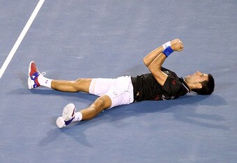 MELBOURNE, AUSTRALIA - JANUARY 29:  Novak Djokovic of Serbia celebrates winning championship point in his men's final match against Rafael Nadal of Spain during day fourteen of the 2012 Australian Open at Melbourne Park on January 29, 2012 in Melbourne, Australia.  (Photo by Lucas Dawson/Getty Images)