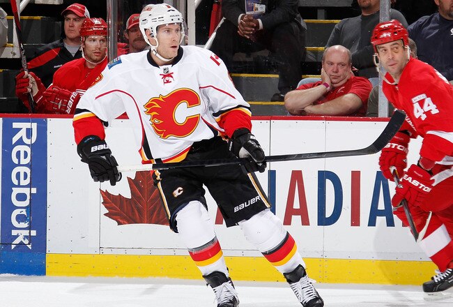 DETROIT, MI - NOVEMBER 03:  Brendan Morrison #8 of the Calgary Flames skates against the Detroit Red Wings at Joe Louis Arena on November 3, 2011 in Detroit, Michigan. Calgary won the game 4-1. (Photo by Gregory Shamus/Getty Images)