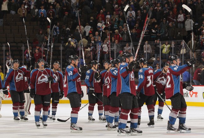 DENVER, CO - DECEMBER 21:  The Colorado Avalanche salute their fans as they celebrate their 3-2 victory over the St. Louis Blues at the Pepsi Center on December 21, 2011 in Denver, Colorado.  (Photo by Doug Pensinger/Getty Images)