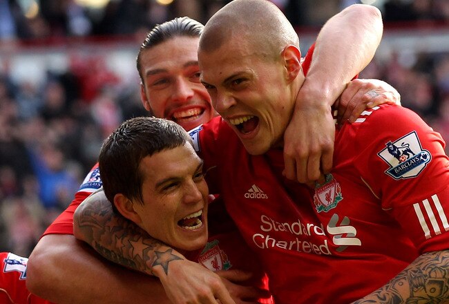 LIVERPOOL, ENGLAND - JANUARY 28:  Daniel Agger of Liverpool celebrates scoring the opening goal with his team mate Martin Skrtel (R) during the FA Cup Fourth Round match between Liverpool and Manchester United at Anfield on January 28, 2012 in Liverpool, England.  (Photo by Alex Livesey/Getty Images)