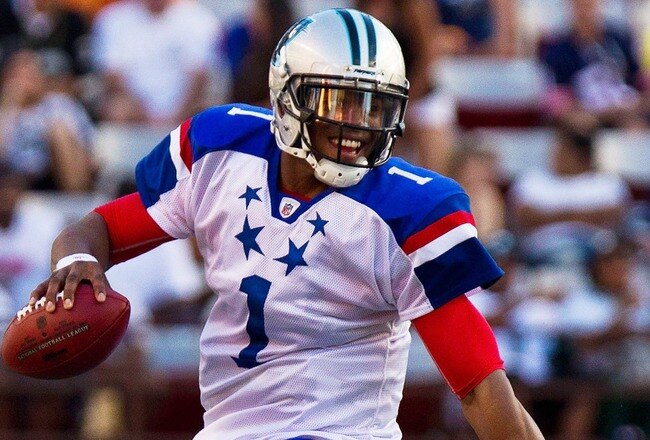 HONOLULU, HI - JANUARY 29:  Cam Newton #1 of the Carolina Panthers scrambles out of the pocket during the 2012 NFL Pro Bowl at Aloha Stadium on January 29, 2012 in Honolulu, Hawaii.  (Photo by Kent Nishimura/Getty Images)