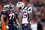 DENVER, CO - DECEMBER 18: Chad Ochocinco #85 of the New England Patriots walks off the field with his head down against the Denver Broncos on December 18, 2011 during the first half at Sports Authority Field at Mile High in Denver, Colorado. The New England Patriots won the game 41-23. (Photo by Marc Piscotty/Getty Images)