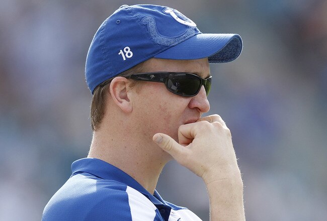 JACKSONVILLE, FL - JANUARY 1: Quarterback Peyton Manning of the Indianapolis Colts looks on during the game against the Jacksonville Jaguars at EverBank Field on January 1, 2012 in Jacksonville, Florida. The Jaguars defeated the Colts 19-13. (Photo by Joe Robbins/Getty Images)
