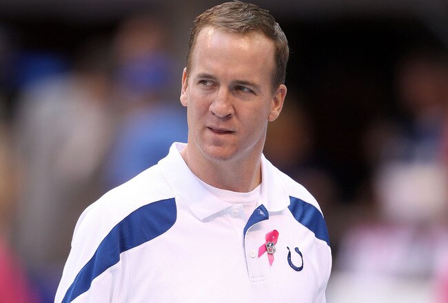 INDIANAPOLIS, IN - OCTOBER 09: Peyton Manning of the Indianapolis Colts watches his team warm up before the NFL game against the Kansas City Chiefs at Lucas Oil Stadium on October 9, 2011 in Indianapolis, Indiana.  (Photo by Andy Lyons/Getty Images)