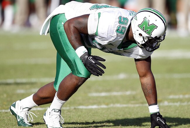 HOUSTON - OCTOBER 22:  Defensive lineman Vinny Curry #99 of the Marshall Thundering Herd lines up against the Houston Cougars at Robertson Stadium on October 22, 2011 in Houston, Texas.  (Photo by Bob Levey/Getty Images)