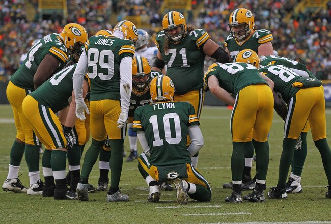 GREEN BAY, WI - JANUARY 01:  Matt Flynn #10 of the Green Bay Packers calls a play in the huddle against the Detroit Lions at Lambeau Field on January 1, 2012 in Green Bay, Wisconsin. The Packers defeated the Lions 45-41.  (Photo by Jonathan Daniel/Getty Images)