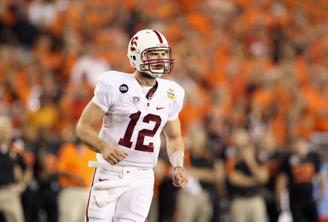 GLENDALE, AZ - JANUARY 02:  Andrew Luck #12 of the Stanford Cardinal looks on against the Oklahoma State Cowboys during the Tostitos Fiesta Bowl on January 2, 2012 at University of Phoenix Stadium in Glendale, Arizona. Oklahoma State won 41-38 in overtime. (Photo by Christian Petersen/Getty Images)