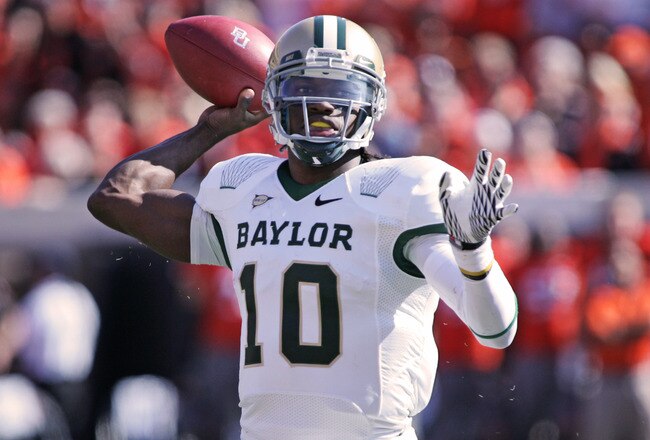 STILLWATER, OK - OCTOBER 29:  Quarterback Robert Griffin III #10 of the Baylor Bears looks to throw in the first half against the Oklahoma State Cowboys on October 29, 2011 at Boone Pickens Stadium in Stillwater, Oklahoma.  Oklahoma State defeated Baylor 59-24.  (Photo by Brett Deering/Getty Images)