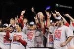 ST LOUIS, MO - OCTOBER 28: Jon Jay #19, Allen Craig #21 and Lance Berkman #12 of the St. Louis Cardinals celebrate with the World Series trophy after defeating the Texas Rangers 6-2 to win the World Series in Game Seven of the MLB World Series at Busch Stadium on October 28, 2011 in St Louis, Missouri.  (Photo by Ezra Shaw/Getty Images)