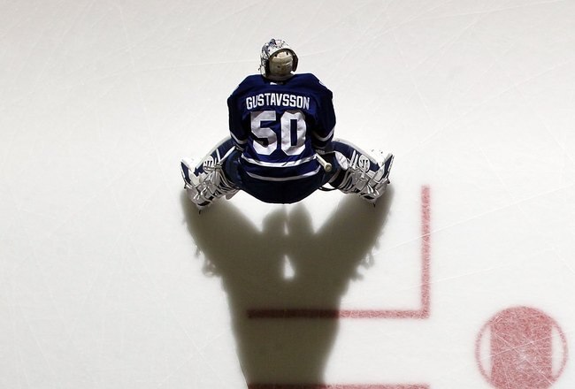 UNIONDALE, NY - JANUARY 24:  Jonas Gustavsson #50 and Nikolai Kulemin #41 of the Toronto Maple Leafs warms up before playing against the New York Islanders on January 24, 2012 at Nassau Coliseum in Uniondale, New York. The Maple Leafs defeated the Islanders 4-3 after overtime.  (Photo by Jim McIsaac/Getty Images)