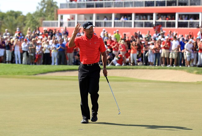 ABU DHABI, UNITED ARAB EMIRATES - JANUARY 29:  Tiger Woods of the USA birdies on the par 4, 9th hole during the final round of the Abu Dhabi HSBC Championship at the Abu Dhabi Golf Club on January 29, 2012 in Abu Dhabi, United Arab Emirates.  (Photo by David Cannon/Getty Images)