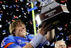 LAS VEGAS, NV - DECEMBER 22:  Quarterback Kellen Moore #11 of the Boise State Broncos holds up the trophy after defeating the Arizona State Sun Devils 56-24 in the MAACO Bowl Las Vegas at Sam Boyd Stadium December 22, 2011 in Las Vegas, Nevada.  (Photo by Ethan Miller/Getty Images)