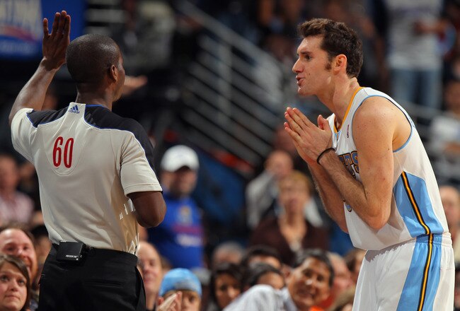 DENVER, CO - JANUARY 13:  Rudy Fernandez #5 of the Denver Nuggets pleades with referee James Williams #60 at the Pepsi Center on January 13, 2012 in Denver, Colorado. The Nuggets defeated the Heat 117-104. NOTE TO USER: User expressly acknowledges and agrees that, by downloading and or using this photograph, User is consenting to the terms and conditions of the Getty Images License Agreement.  (Photo by Doug Pensinger/Getty Images)
