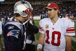 FOXBORO, MA - NOVEMBER 6:    Tom Brady #12 of the New England Patriots congratulates  Eli Manning #10 of the New York Giants after the New York Giants 24-20 win on November 6, 2011 in Foxboro, Massachusetts. (Photo by Jim Rogash/Getty Images)