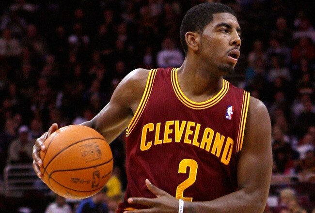 CLEVELAND, OH - DECEMBER 26:  Kyrie Irving #2 of the Cleveland Cavaliers brings the ball up court against the Toronto Raptors during the season opener at Quicken Loans Arena on December 26, 2011 in Cleveland, Ohio. NOTE TO USER: User expressly acknowledges and agrees that, by downloading and or using this photograph, User is consenting to the terms and conditions of the Getty Images License Agreement.  (Photo by Mike Lawrie/Getty Images)