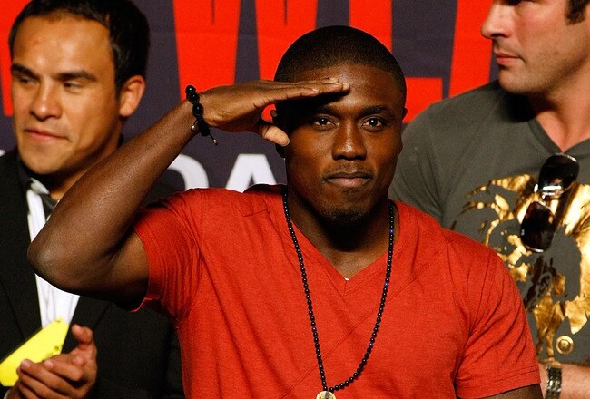 LAS VEGAS - APRIL 30:  Boxer Andre Berto reacts to the crowd from the stage before the start of the Floyd Mayweather Jr. and Shane Mosley weigh-in at the MGM Grand Garden Arena on April 30, 2010 in Las Vegas, Nevada. Mayweather and Mosley will meet in a 12-round welterweight bout on May 1, 2010 in Las Vegas.  (Photo by Ethan Miller/Getty Images)