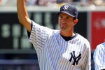 NEW YORK - JULY 19:  New York Yankee Mike Mussina waves to the crowd during the teams 63rd Old Timers Day before the game against the Detroit Tigers on July 19, 2009 at Yankee Stadium in the Bronx borough of New York City.  (Photo by Jim McIsaac/Getty Images)