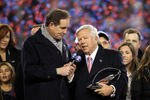 FOXBORO, MA - JANUARY 22:  Robert Kraft, team owner of the New England Patriots celebrates with the Lamar Hunt Trophy after his team defeated the Baltimore Ravens in the AFC Championship Game at Gillette Stadium on January 22, 2012 in Foxboro, Massachusetts. The New England Patriots defeated the Baltimore Ravens 20-23.  (Photo by Jim Rogash/Getty Images)