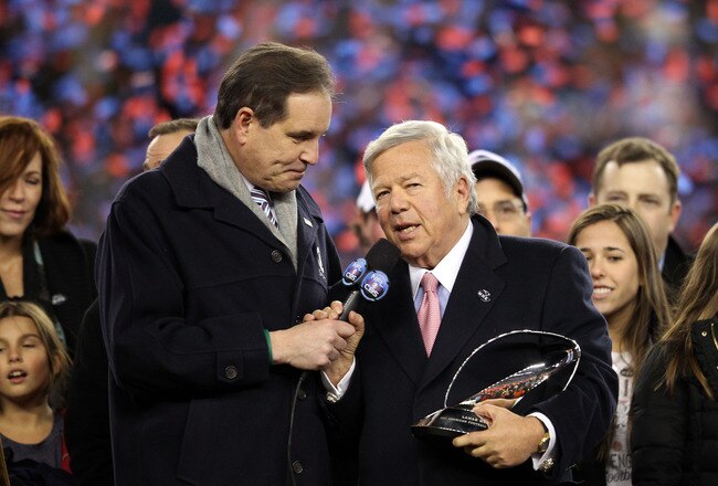 FOXBORO, MA - JANUARY 22:  Robert Kraft, team owner of the New England Patriots celebrates with the Lamar Hunt Trophy after his team defeated the Baltimore Ravens in the AFC Championship Game at Gillette Stadium on January 22, 2012 in Foxboro, Massachusetts. The New England Patriots defeated the Baltimore Ravens 20-23.  (Photo by Jim Rogash/Getty Images)