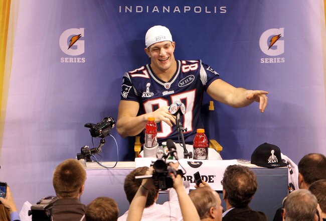 INDIANAPOLIS, IN - JANUARY 31:  Rob Gronkowski #87 of the New England Patriots answers questions from the media during Media Day ahead of Super Bowl XLVI against the New York Giants at Lucas Oil Stadium on January 31, 2012 in Indianapolis, Indiana.  (Photo by Michael Heiman/Getty Images)