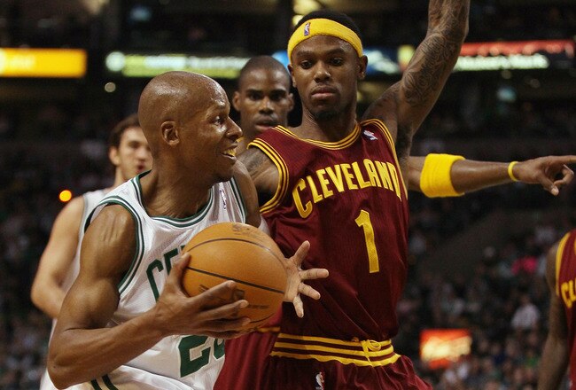 BOSTON, MA - JANUARY 25:  Ray Allen #20 of the Boston Celtics drives past Daniel Gibson #1  of the of the Cleveland Cavaliers on January 25, 2011 at the TD Garden in Boston, Massachusetts. The Celtics defeated the Cavaliers 112-95.  NOTE TO USER: User expressly acknowledges and agrees that, by downloading and/or using this Photograph, User is consenting to the terms and conditions of the Getty Images License Agreement.  (Photo by Elsa/Getty Images)