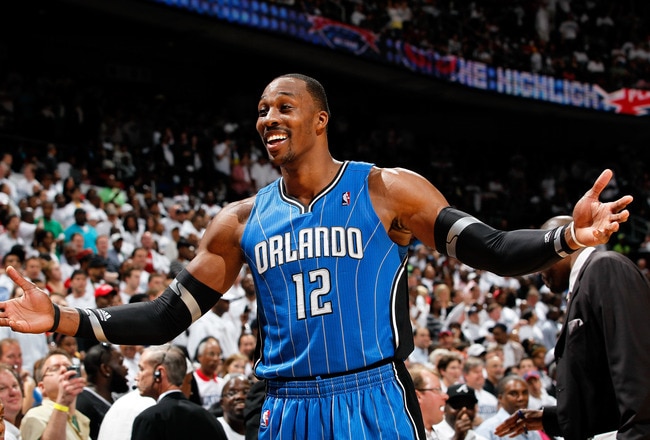 ATLANTA, GA - APRIL 22:  Dwight Howard #12 of the Orlando Magic reacts after being called for a technical foul against the Atlanta Hawks during Game Three of the Eastern Conference Quarterfinals in the 2011 NBA Playoffs at Philips Arena on April 22, 2011 in Atlanta, Georgia.  (Photo by Kevin C. Cox/Getty Images)