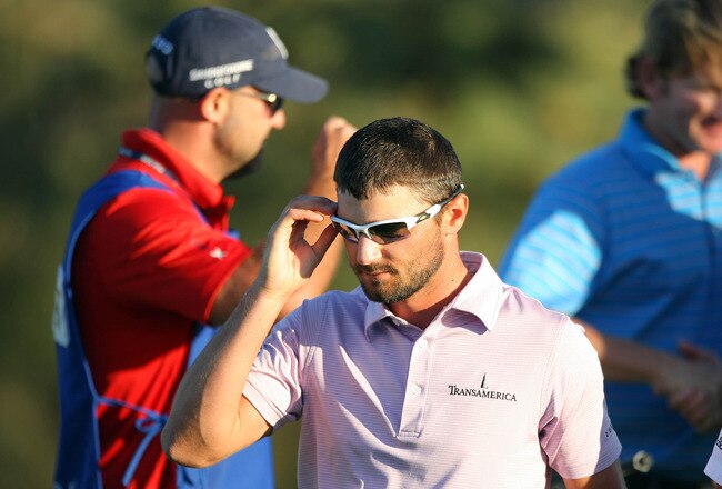 LA JOLLA, CA - JANUARY 29:  Kyle Stanley walks off the green after Brandt Snedeker's playoff victory during the final round of the Farmers Insurance Open at Torrey Pines Golf Course, South Course on January 29, 2012 in La Jolla, California. (Photo by Donald Miralle/Getty Images)