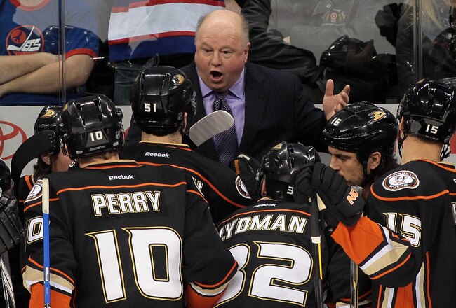 WINNIPEG, CANADA - DECEMBER 17: Anaheim Ducks' head coach Bruce Boudreau speaks to his team at the bench in a game against the Winnipeg Jets in NHL action at the MTS Centre on December 17, 2011 in Winnipeg, Manitoba, Canada. (Photo by Marianne Helm/Getty Images)