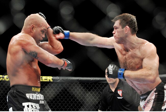 LAS VEGAS - NOVEMBER 21: Tito Ortiz (L) battles Forrest Griffin (R) during their Light Heavyweight Fight at the UFC 106 at Mandalay Bay Events Center on November 21, 2009 in Las Vegas, Nevada. (Photo by Jon Kopaloff/Getty Images)