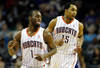 CHARLOTTE, NC - JANUARY 14:  Teammates Kemba Walker and Gerald Henderson #15 of the Charlotte Bobcats celebrate against the Golden State Warriors during their game at Time Warner Cable Arena on January 14, 2012 in Charlotte, North Carolina.  NOTE TO USER: User expressly acknowledges and agrees that, by downloading and or using this photograph, User is consenting to the terms and conditions of the Getty Images License Agreement.  (Photo by Streeter Lecka/Getty Images)