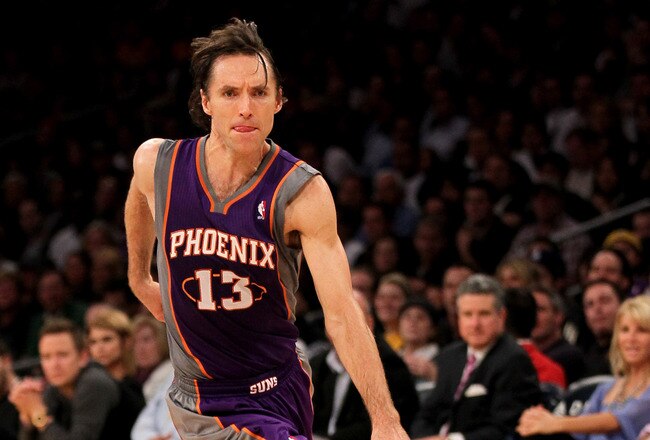 LOS ANGELES, CA - JANUARY 10:  Steve Nash #13 of the Phoenix Suns drives with the ball against the Los Angeles Lakers at Staples Center on January 10, 2012 in Los Angeles, California.  The Lakers won 99-83. NOTE TO USER: User expressly acknowledges and agrees that, by downloading and or using this photograph, User is consenting to the terms and conditions of the Getty Images License Agreement.  (Photo by Stephen Dunn/Getty Images)