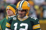 GREEN BAY, WI - JANUARY 15:  Aaron Rodgers #12 of the Green Bay Packers looks on against the New York Giants during their NFC Divisional playoff game at Lambeau Field on January 15, 2012 in Green Bay, Wisconsin.  (Photo by Jonathan Daniel/Getty Images)
