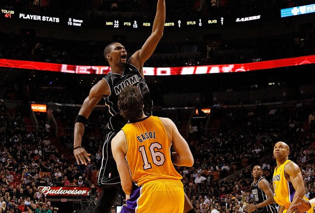 MIAMI, FL - JANUARY 19: Chris Bosh #1 of the Miami Heat shoots over Pau Gasol #16 of the Los Angeles Lakers during a game  at American Airlines Arena on January 19, 2012 in Miami, Florida. NOTE TO USER: User expressly acknowledges and agrees that, by downloading and/or using this Photograph, User is consenting to the terms and conditions of the Getty Images License Agreement.  (Photo by Mike Ehrmann/Getty Images)